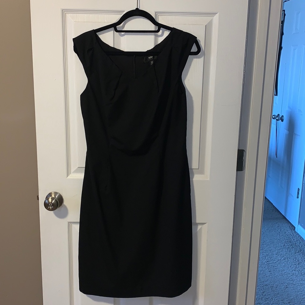 Little black dress. Hits just below the knee.